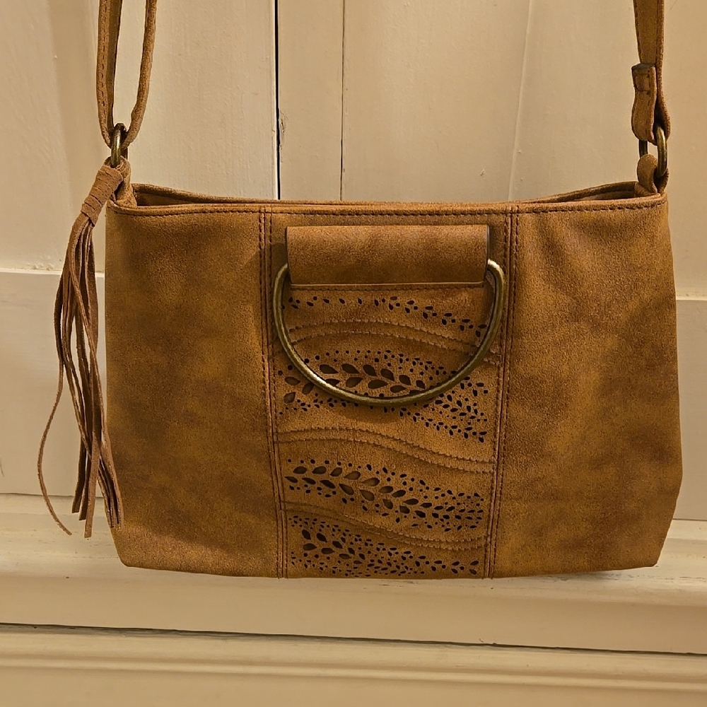 Light brown shoulder bag with punched front panel design